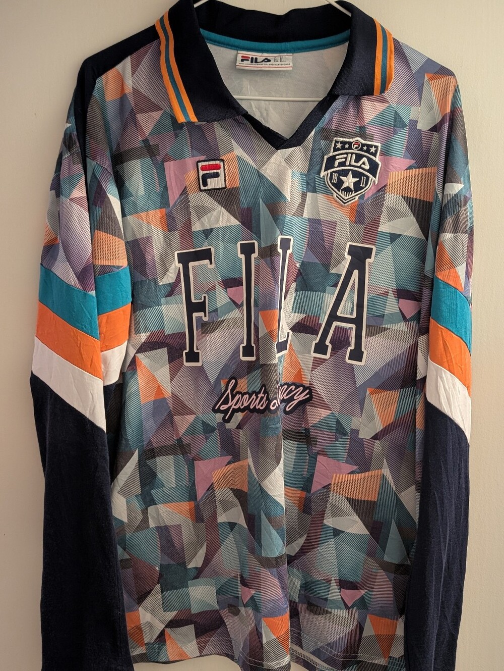 FILA Geometric Long-Sleeve Jersey in Teal, Navy & Orange. Large